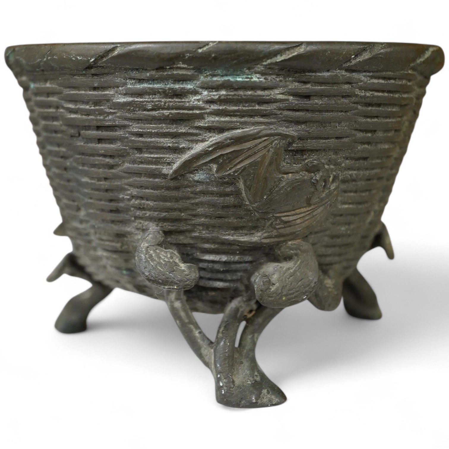 A Japanese bronze censer shaped as a basket on three legs. 8.5cm high.